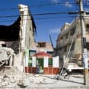 A man exits a restaurant after he looked for his belongings. An earthquake rocked Port au Prince on January 12, 2010.