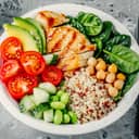 Plateful of variety of food, including legumes, vegetables and meat