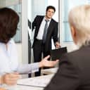 Office worker coming late to a meeting