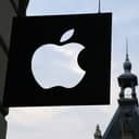 Closeup of an Apple logo sign on a building