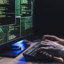 Visual representation of a person hacking