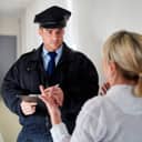 Woman gives a statement to a police officer after she witnessed a crime.
