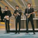 The Beatles performing in The Ed Sullivan Show, 1964.