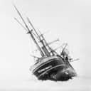 Black and white image of a historical boat making its journey towards Antarctica around late October 1915.