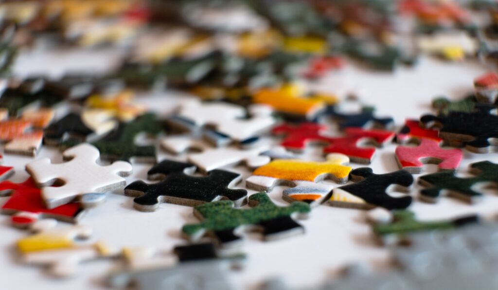 Puzzle pieces spread out on a table