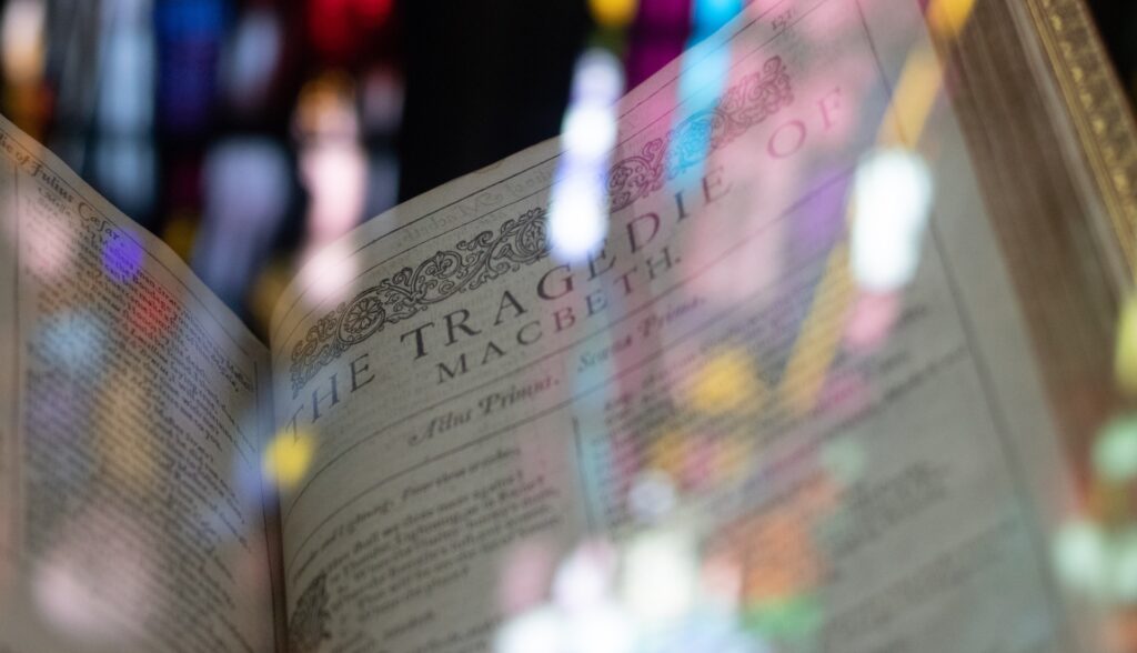 A book open to the first page of 'Macbeth'