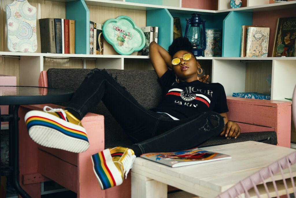 A young woman relaxing on a small sofa