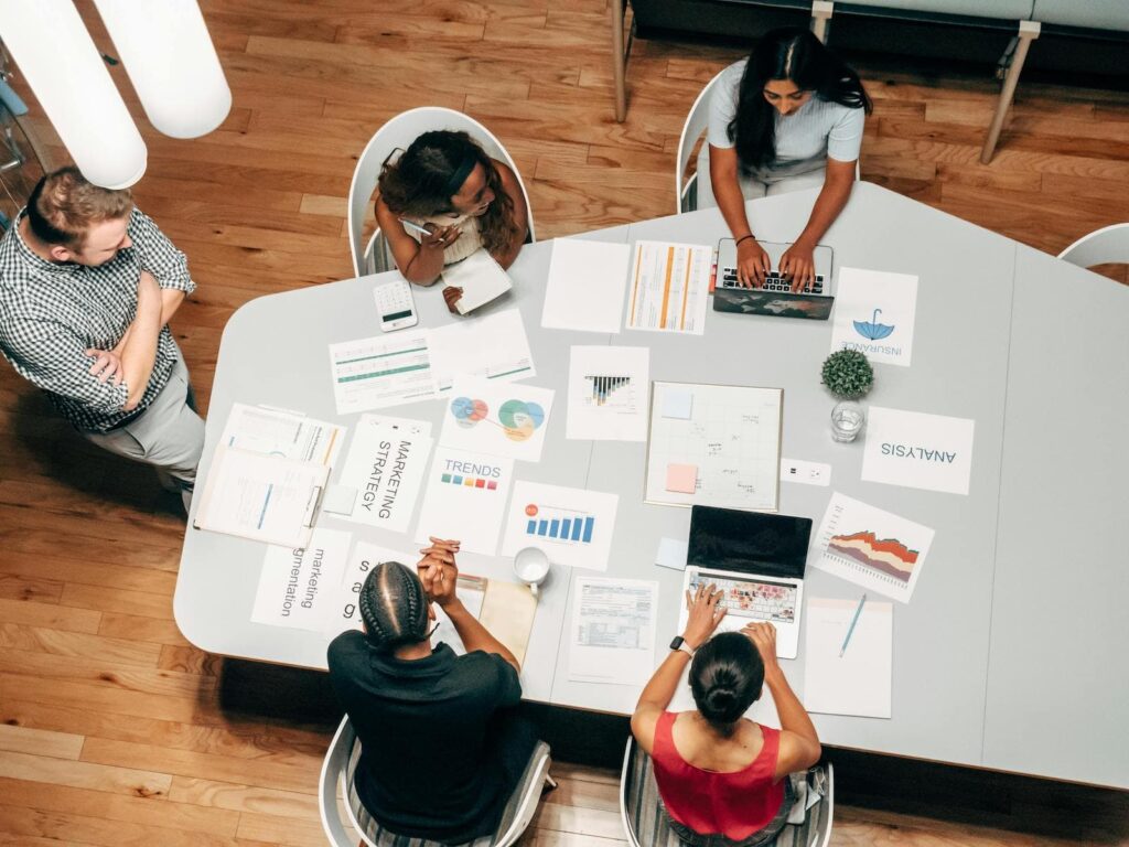 A group of marketing professionals working on an SEO campaign in an office