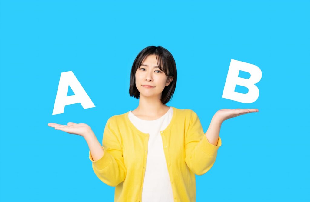 A confused woman holding a different choice in either hand