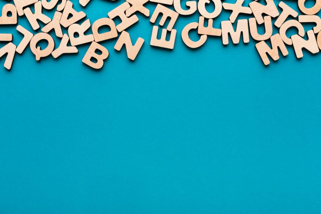 A jumble of random wooden letters